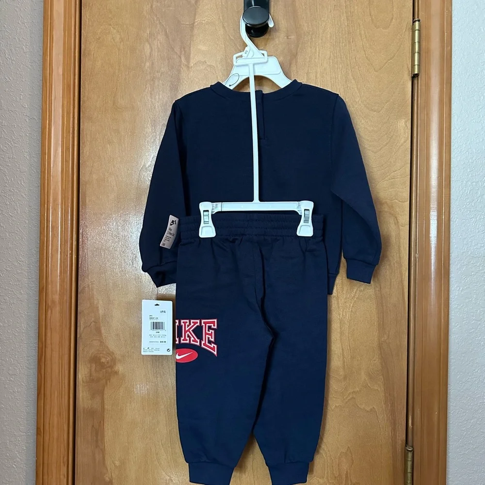 2 piece Nike Sweatsuit Navy Blue Top with Jogger bottoms and Red accents